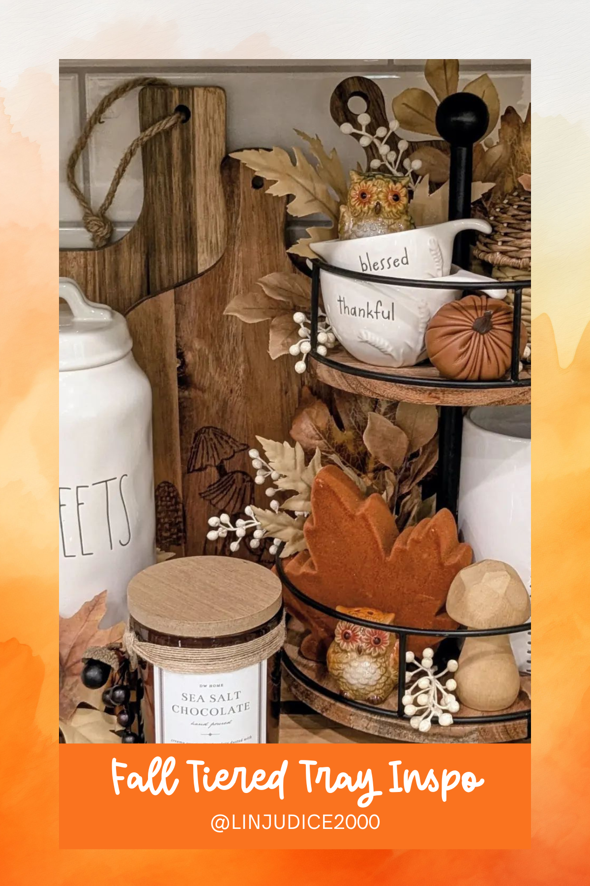 This tiered tray blends woodsy vibes with cozy farmhouse elements, featuring adorable owls, fall leaves, and warm ceramics. It’s all about that subtle autumn charm!