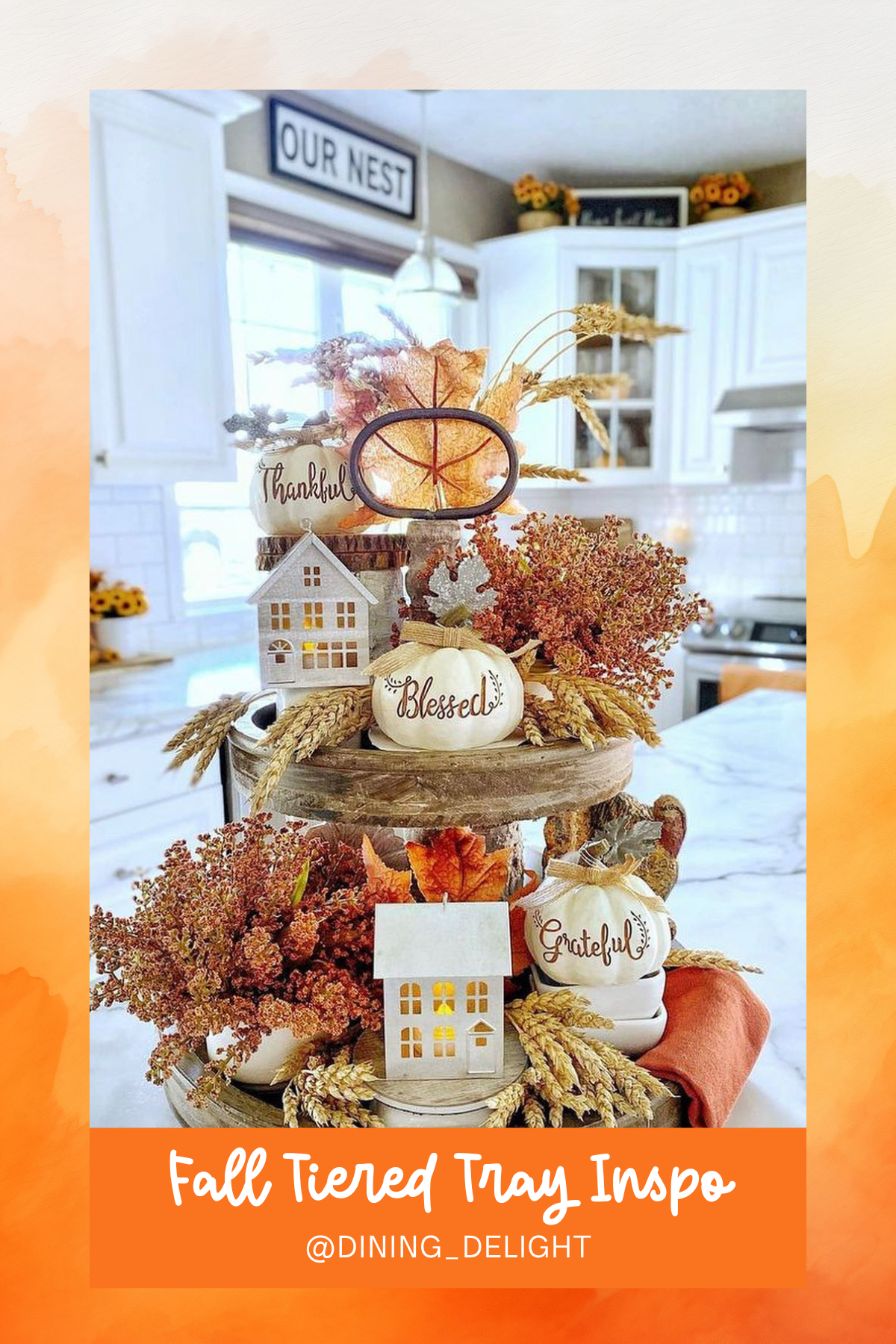 This farmhouse-inspired tray is filled with warm autumn vibes! With wheat sprigs, cozy pumpkins, and charming miniature houses, it reminds us to stay "thankful, blessed, and grateful" through the season.