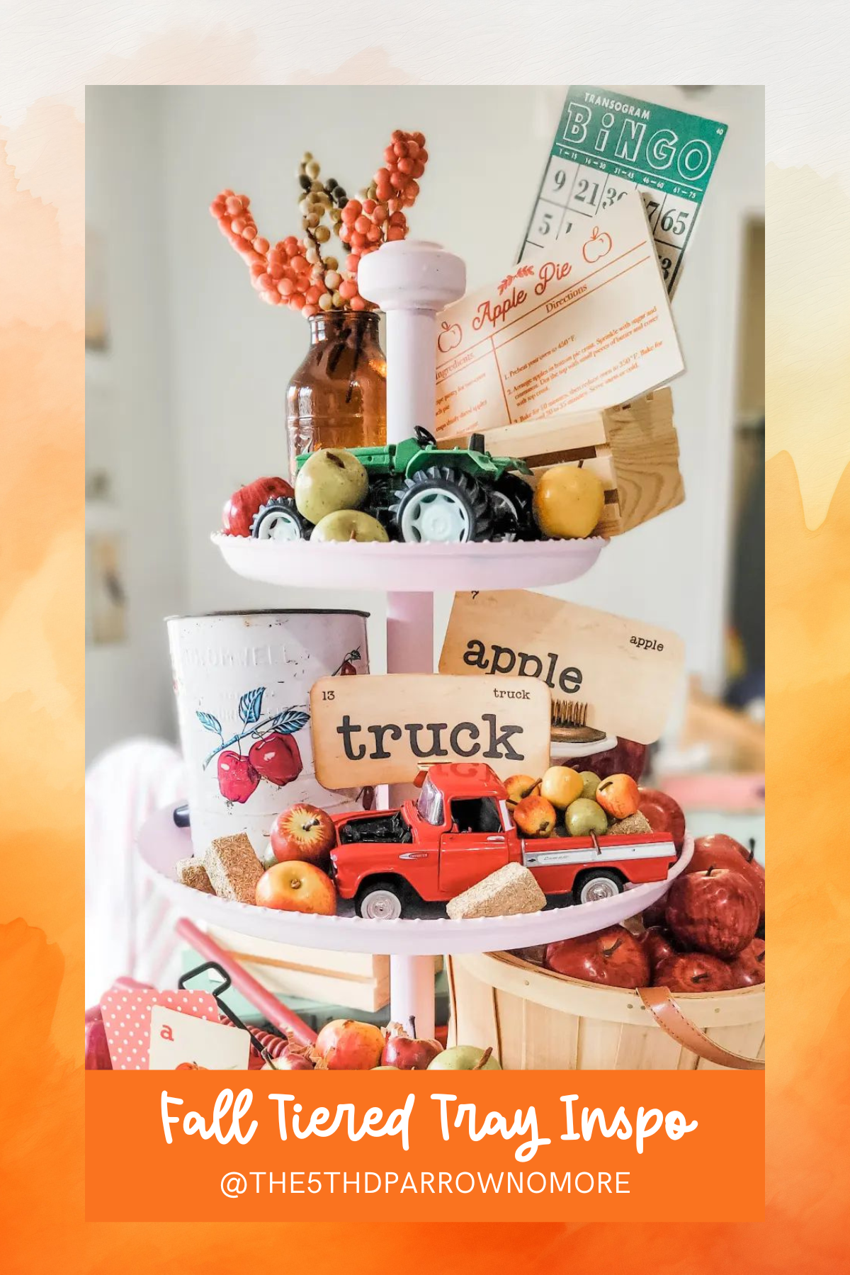 This tray brings the freshness of a harvest right to your table. Filled with miniature apples, rustic toys, and autumn-themed accents, it feels like a trip to the orchard!