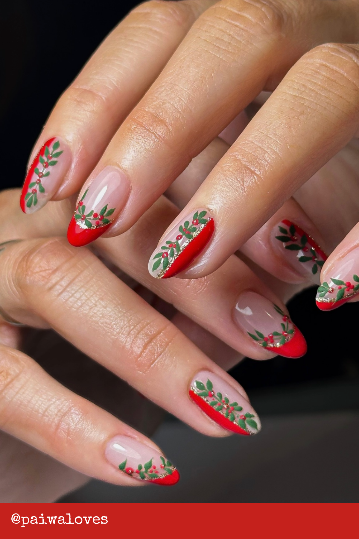 Bold Red French Tips with Greenery: A classic red French tip gets a holiday twist with holly berry accents and golden sparkles. This style screams Trending Christmas Nails while being Simple Holiday Nails anyone can pull off.