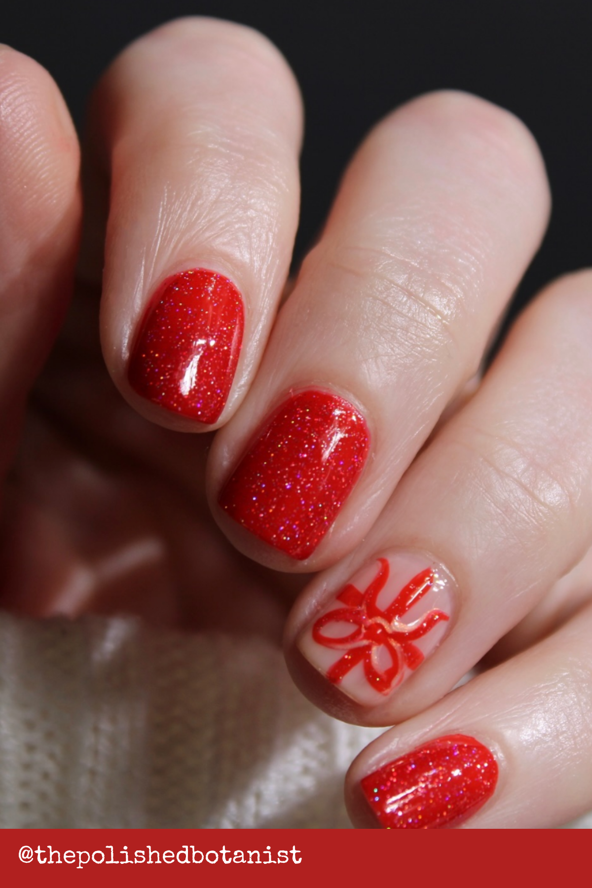 Sparkling Red Gift Wrap Accent Nail: Keep it minimalist with sparkling red polish and a single accent nail designed like a wrapped gift. This is one of the simplest Christmas Manicure Ideas yet still screams "festive fun!"