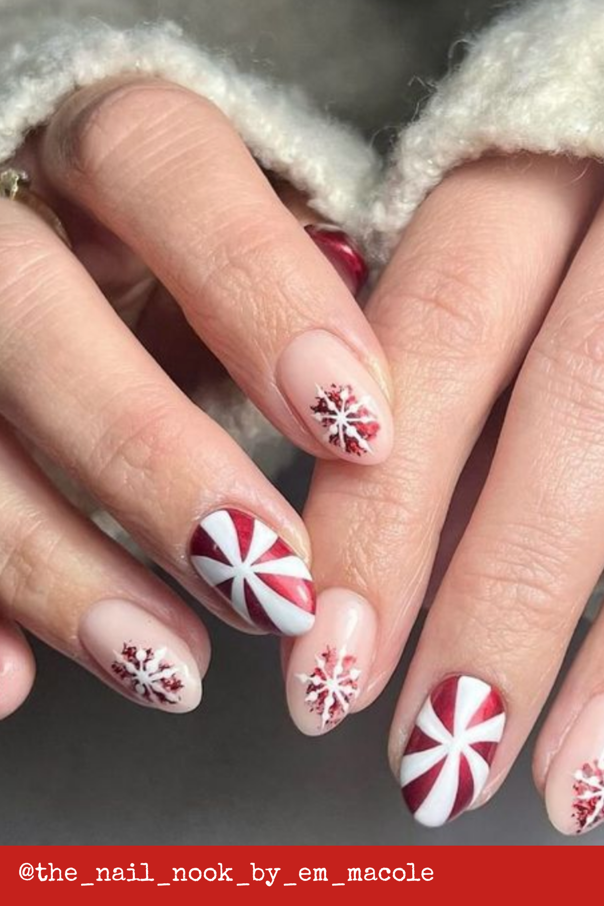 Candy Cane Stripes and Snowflakes: Classic peppermint swirl nails with delicate snowflakes are perfect for showcasing your love for December Holiday Nails. These are truly iconic Christmas Nail Designs Holiday lovers will adore.