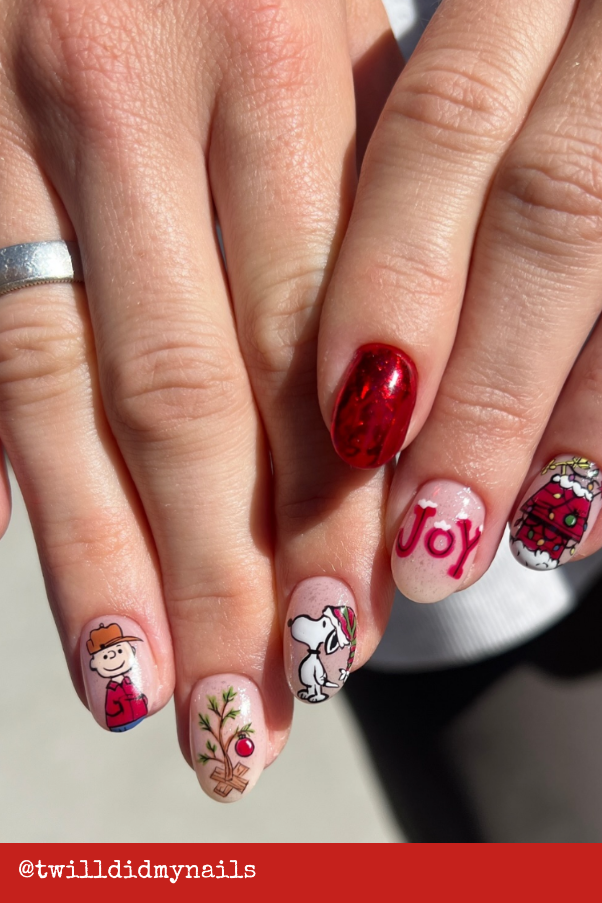 Charlie Brown Christmas Nails: Bring the nostalgia with hand-painted Snoopy, Charlie Brown, and the iconic tiny Christmas tree. These nails combine Fun Holiday Nails with a heartwarming, whimsical twist.