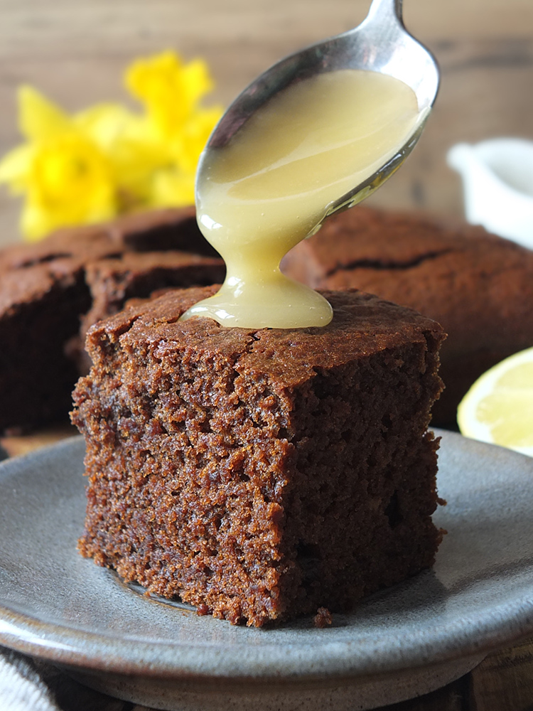 This gingerbread cake is the perfect mix of festive and cozy. The addition of a tangy lemon sauce takes it to the next level, making it a favorite for holiday gatherings.