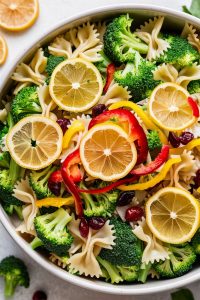 Add a burst of flavor to your summer gatherings with this Gluten-Free Broccoli & Bow-Tie Pasta Salad! The secret ingredient? Salt-cured lemons for a zesty surprise. Make it ahead and chill – it's a party favorite! ???