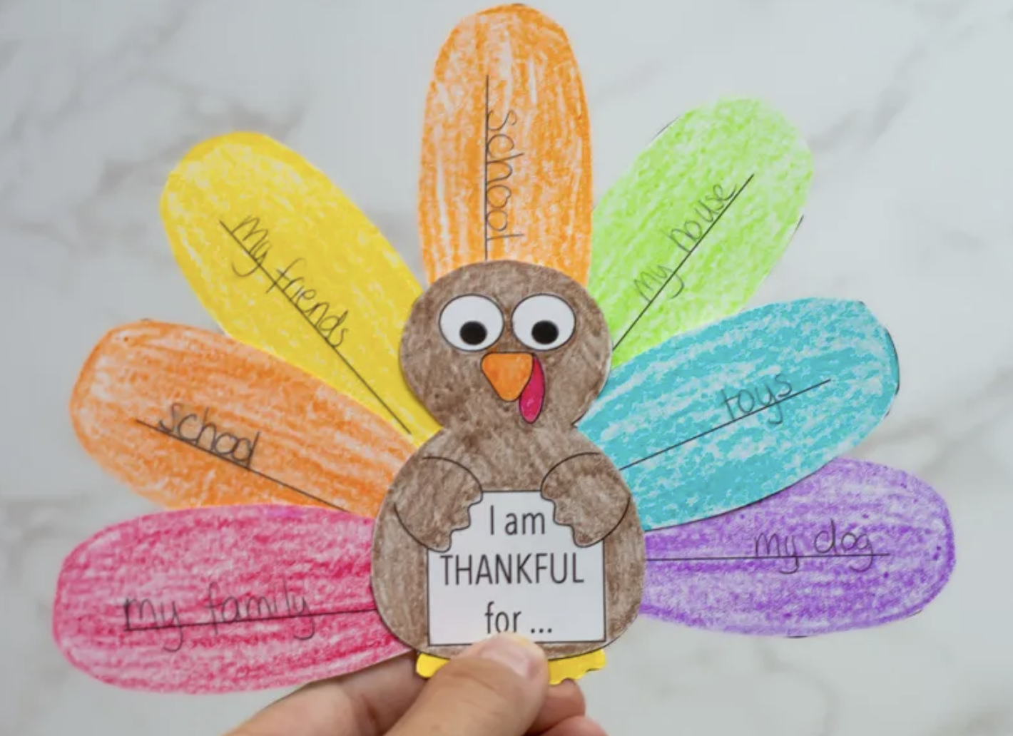 This cute and customizable turkey craft lets kids showcase their gratitude with colorful feathers. Each feather holds a message of thankfulness, making it a wonderful way to reflect on the season. It’s simple enough for toddlers but engaging for older kids too.