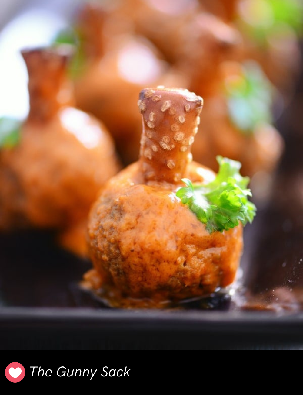 These adorable Buffalo Meatball Pumpkins are a fun twist on your usual meatballs, with a spicy buffalo kick! Shaped like little pumpkins, they make the perfect finger food for your Halloween party. Easy to pop in your mouth, they're a crowd-pleaser that’s as cute as it is delicious.