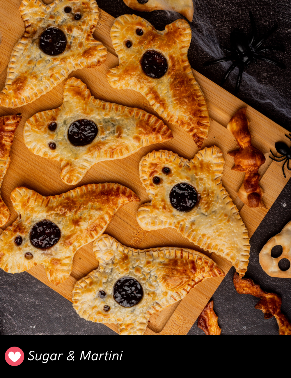 Get ready to wow your guests with these Halloween Pies! With a variety of fun, spooky designs like spiderwebs and pumpkins, these mini pies are as tasty as they are festive. Perfect for dessert, these bite-sized treats are great for any Halloween gathering.