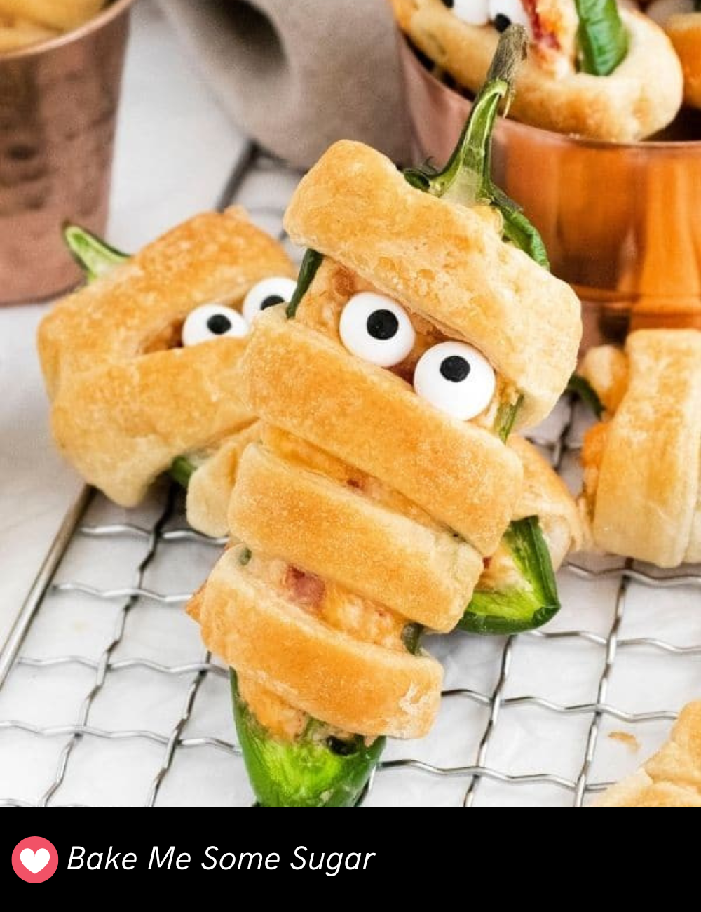 Add a spicy kick to your Halloween party with these Jalapeño Popper Crescent Rolls. They’re stuffed with cream cheese, jalapeños, and cheddar, then rolled up in buttery crescent dough. These little bites are great for feeding a crowd and are sure to disappear fast!