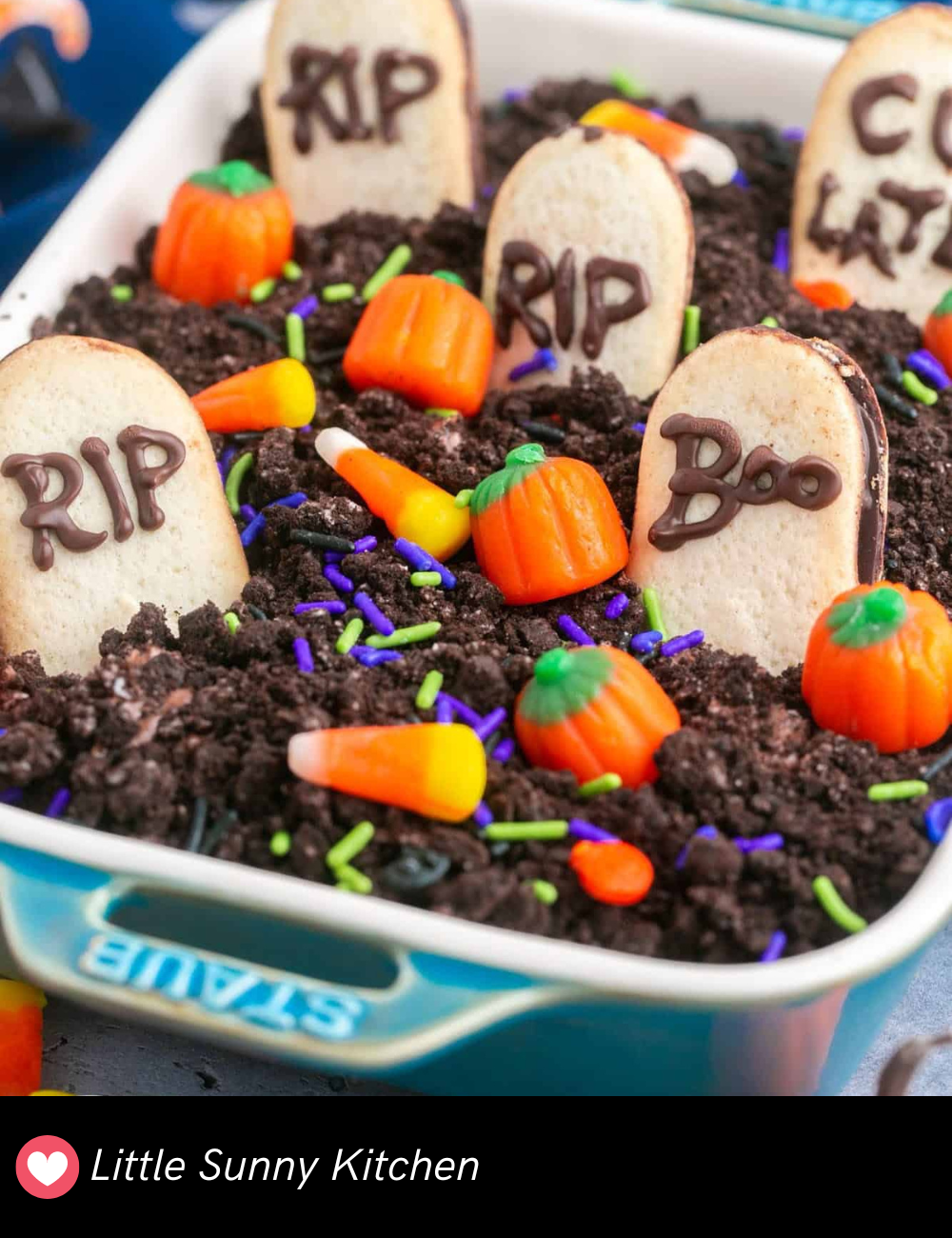 For a sweet treat, this Graveyard Chocolate Cheesecake Dip is both creepy and delicious! It’s a rich chocolate dip topped with cookie “gravestones” and candy bones, making it look like a spooky graveyard. Serve with graham crackers or fruit for a fun dessert dip at your party.