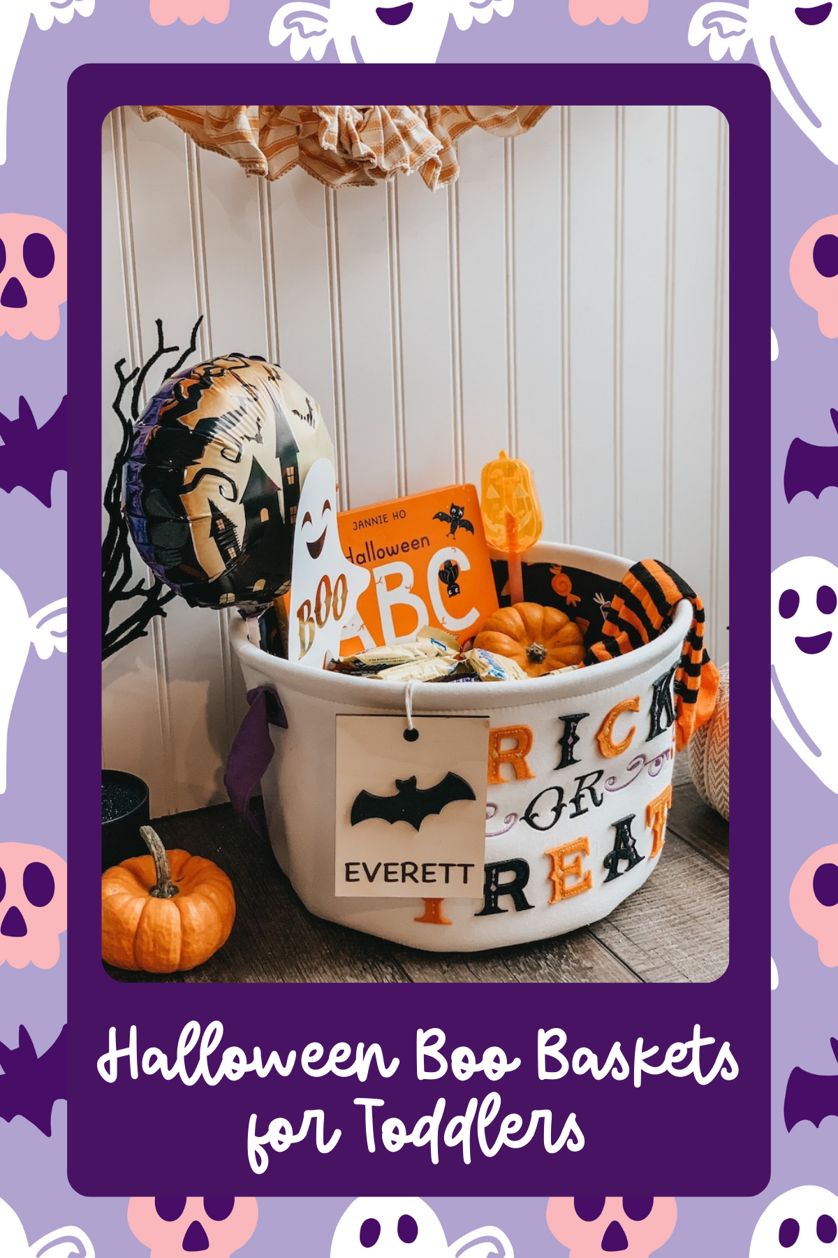 This personalized basket includes a festive mix of treats like a Halloween-themed ABC book, cute pumpkins, and a candy stash. The custom name tag and bat detail add a lovely touch!