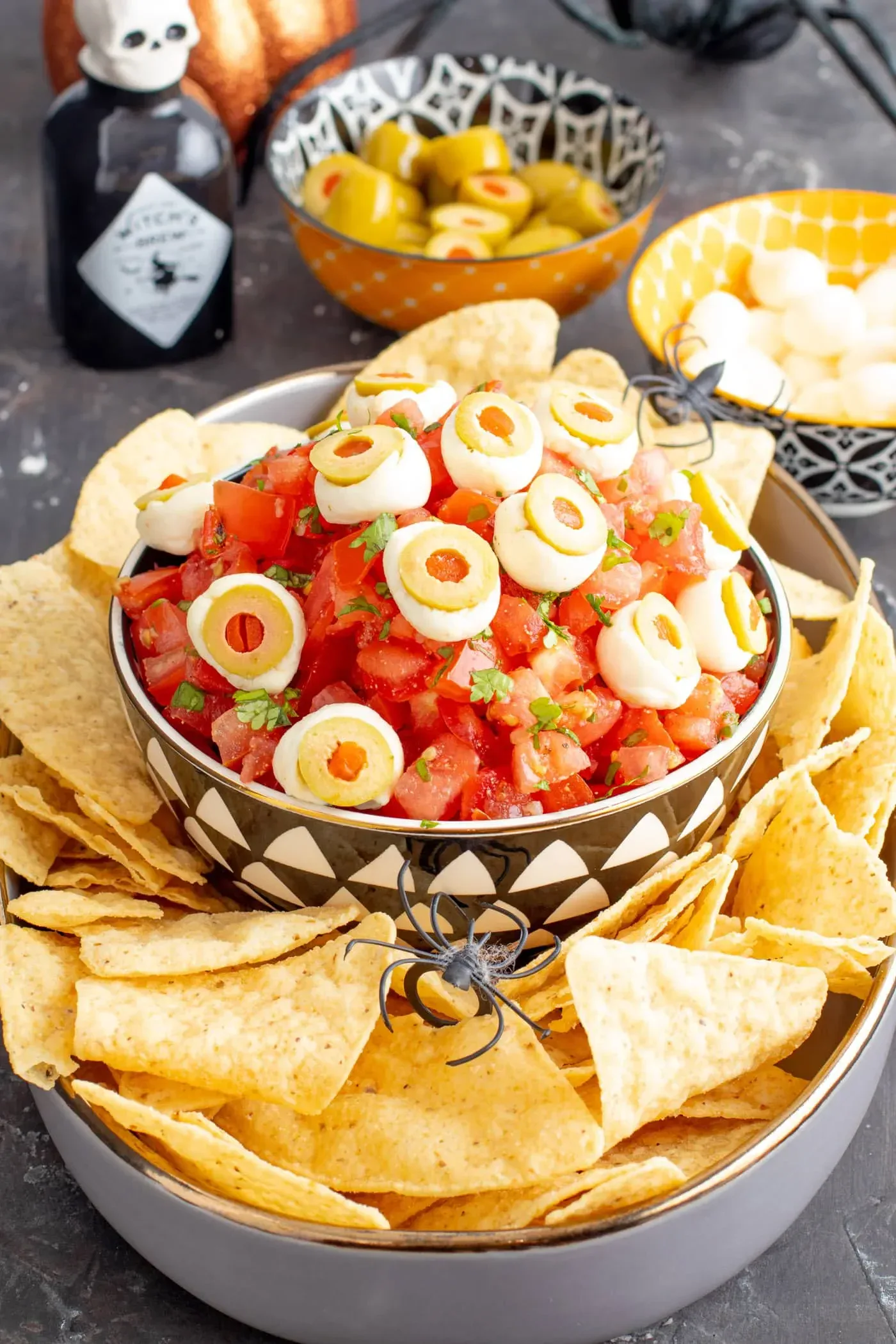 Give your chips and salsa a spooky makeover by topping your dip with mozzarella and olive âeyeballsââeasy to assemble and creepy in the best way.