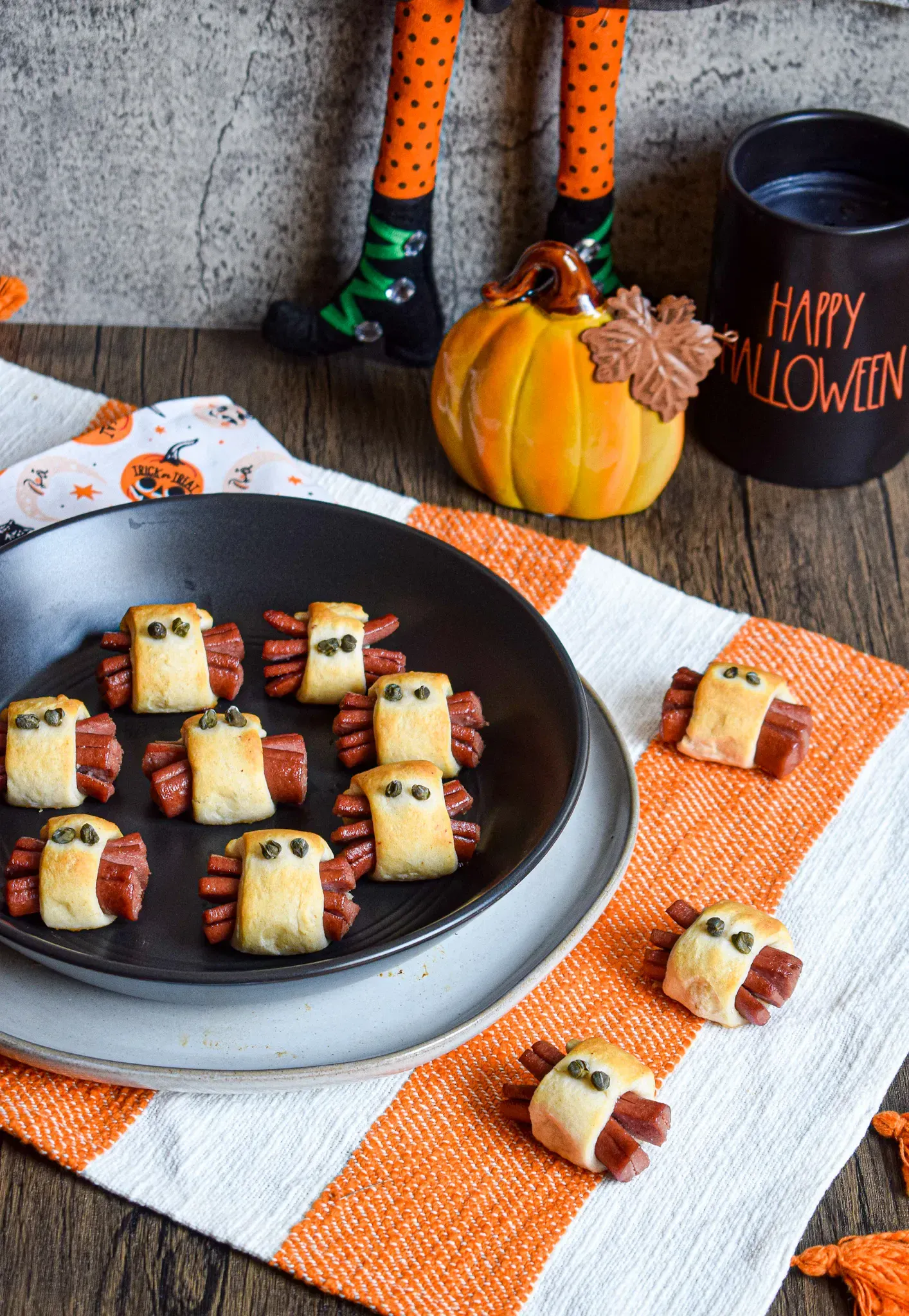 These crescent roll spiders have hot dog âlegsâ and peppercorn or caper âeyesââadorably creepy and a total crowd-pleaser for kids.