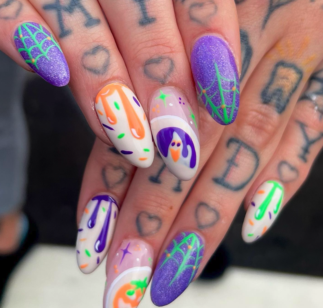 Neon Spookiness – A bold mix of purple, neon green, and orange with ghosts, webs, and drips for a glow-in-the-dark vibe.