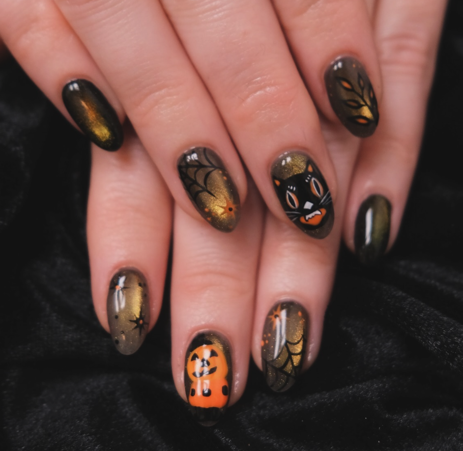 Vintage Halloween Magic – Smoky black-and-gold nails with retro cats, pumpkins, and spiderwebs for a classic spooky look.