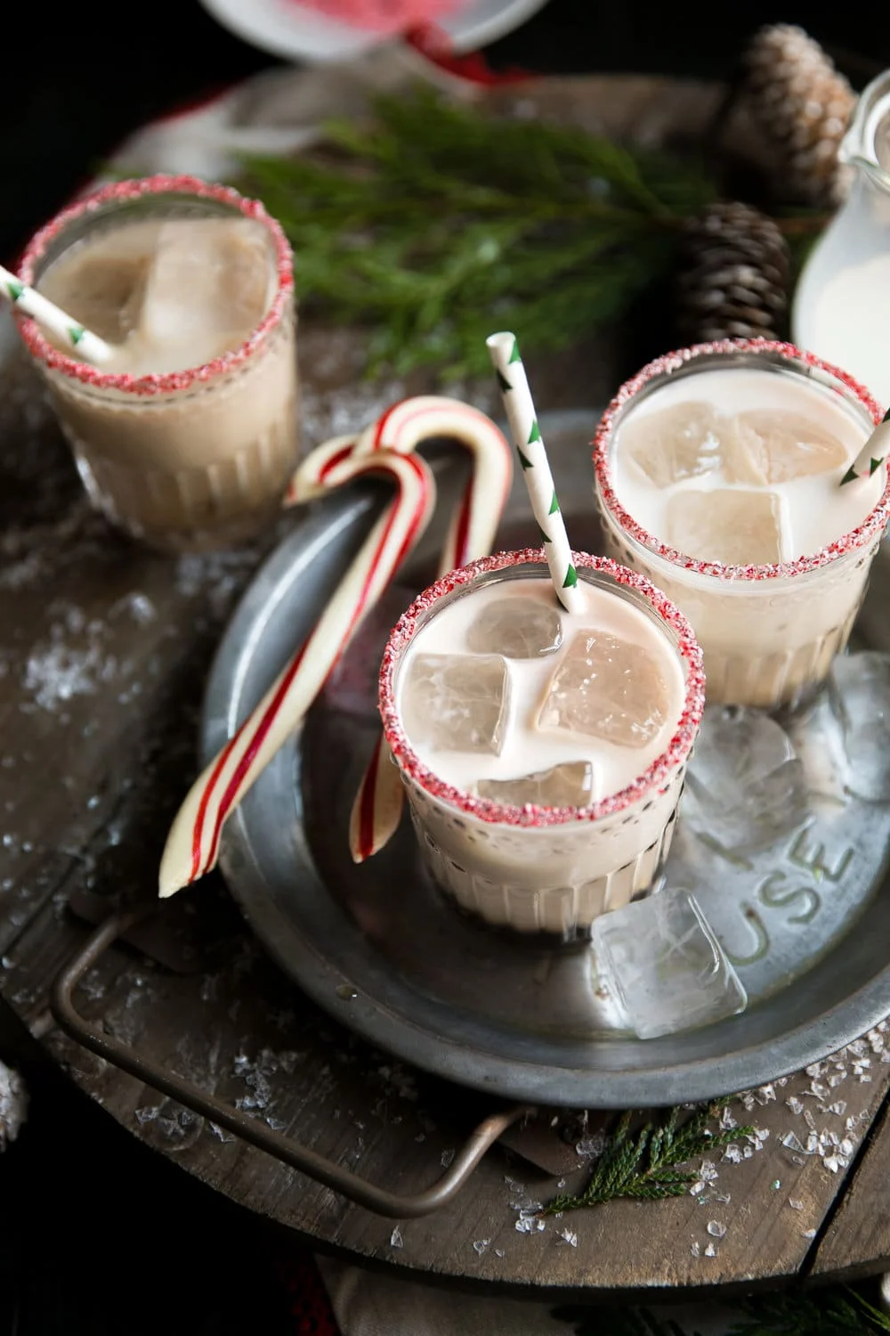 A festive twist on the classic White Russian, this cocktail features vodka, coffee liqueur, and a splash of peppermint syrup. Garnish with crushed candy canes for extra flair.