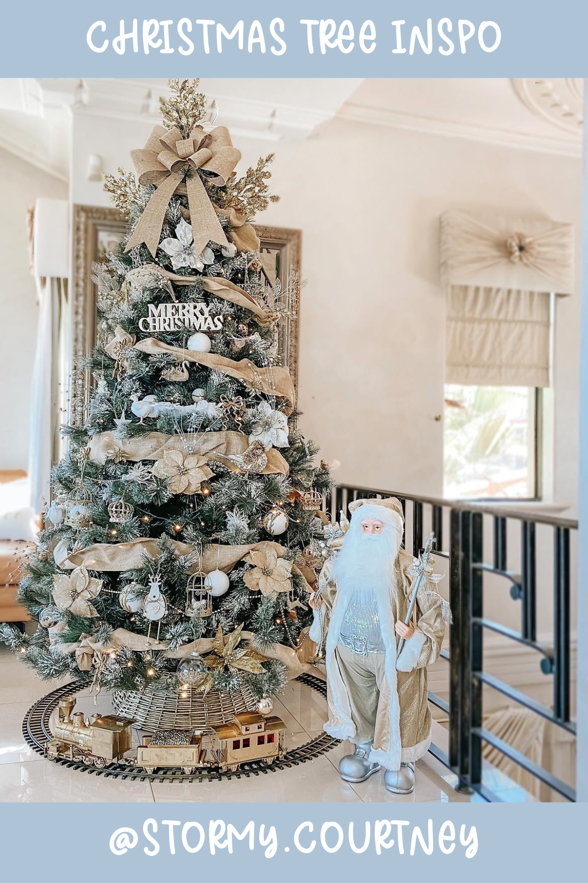 Tree 13 (@STORMY.COURTNEY): This elegant tree radiates a serene winter glow with its neutral palette of whites, golds, and burlap accents. The large bow topper and touches of metallic decor bring an air of sophistication, making it an ideal choice for those who love a chic yet rustic holiday feel.