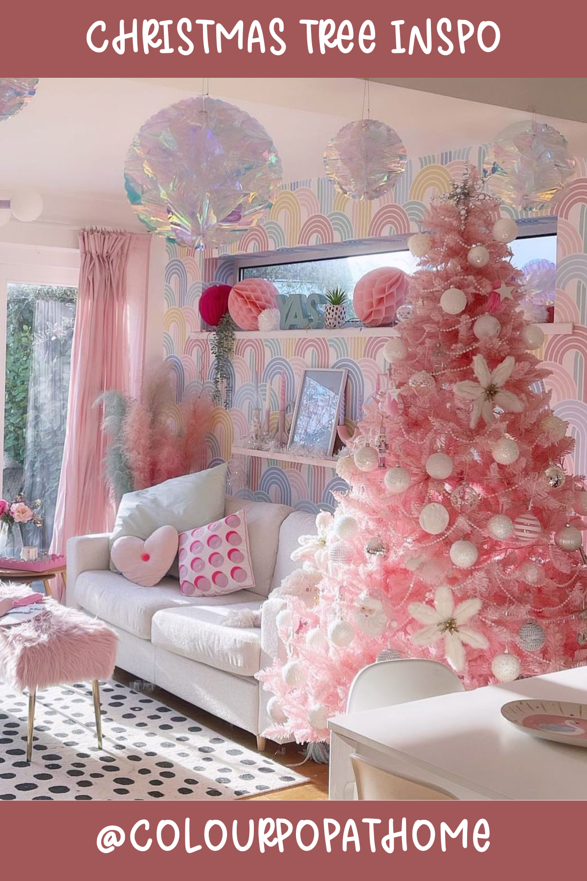 Tree 5 (@COLOURPOPATHOME): Bright and bold, this pink Christmas tree brings a playful and cheerful vibe to the season! Covered in whimsical white ornaments, it perfectly complements the room's pastel decor and radiates a fun, trendy, and ultra-modern holiday spirit.