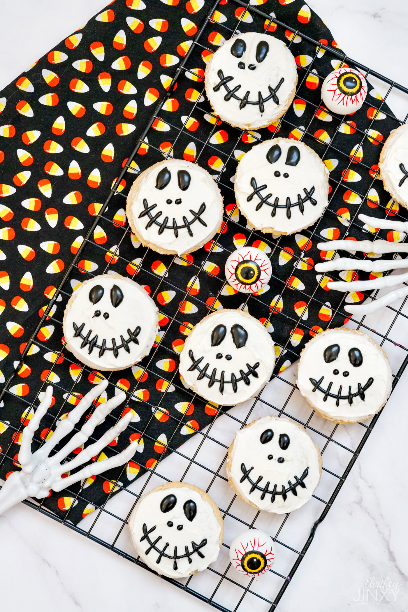 Channeling The Nightmare Before Christmas vibe, these cookies feature Jackâs signature stitched smile. Theyâre simple to decorate with black icing and make a spook-tacular statement on your cookie tray.