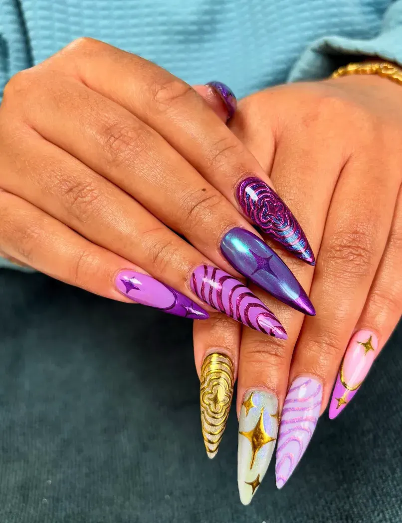 Metallic purple and gold stars take center stage here — a cosmic twist that blends K-Pop glam with supernatural sparkle.