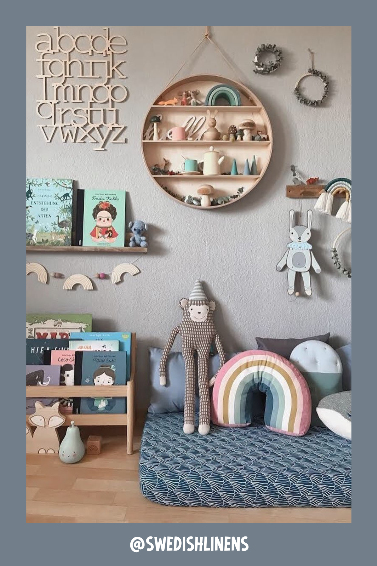 Playful and colorful, this nook is packed with personality! A rainbow pillow, plush toys, and a mix of patterned cushions sit atop a soft mattress, creating an inviting spot to settle down with a book. The round wall shelf and alphabet art add a charming touch, making this nook as fun as it is functional.