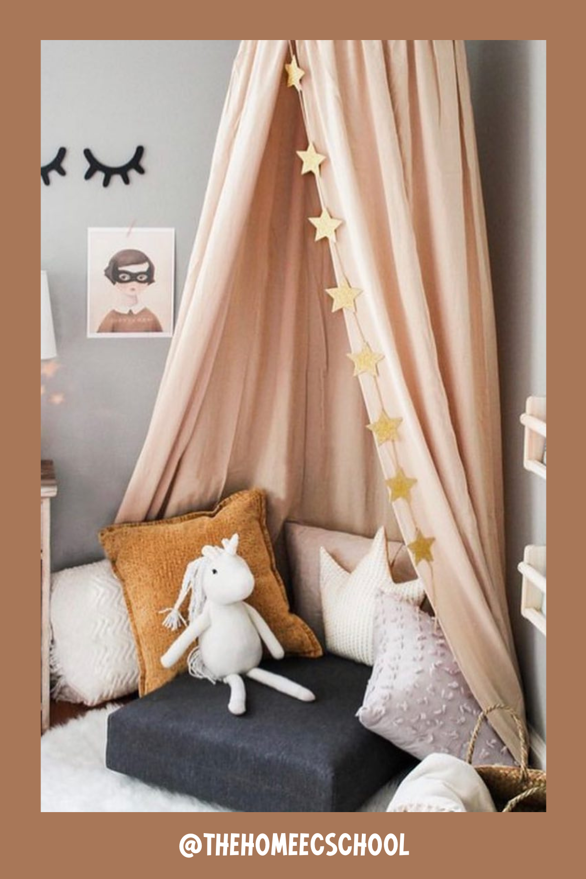 Simple and sweet, this nook has a magical canopy draped over a pile of cushions, creating a little hideaway for reading adventures. The star garland adds a sprinkle of wonder, while the wall-mounted bookshelf keeps stories within easy reach. With a few plush friends and a soft rug, it's an enchanting spot to spark a love for reading.