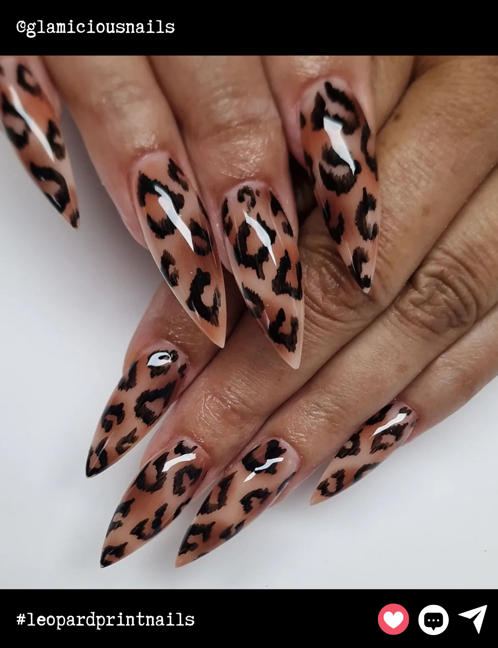 Stiletto-shaped nails in a classic nude base with bold leopard print. These sharp, pointed nails radiate fierce energy, perfect for anyone looking to turn heads with their daring design.