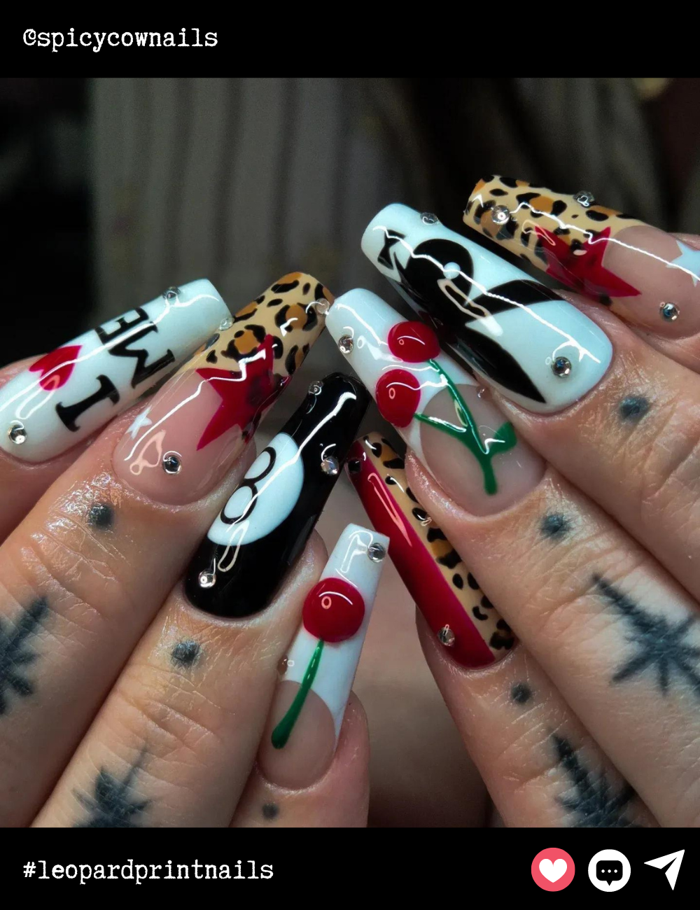 Long coffin nails are pure drama with bold leopard print, cherries, and graphic black-and-white details. Embellished with shiny rhinestones, these nails are for someone who loves to make a statement.