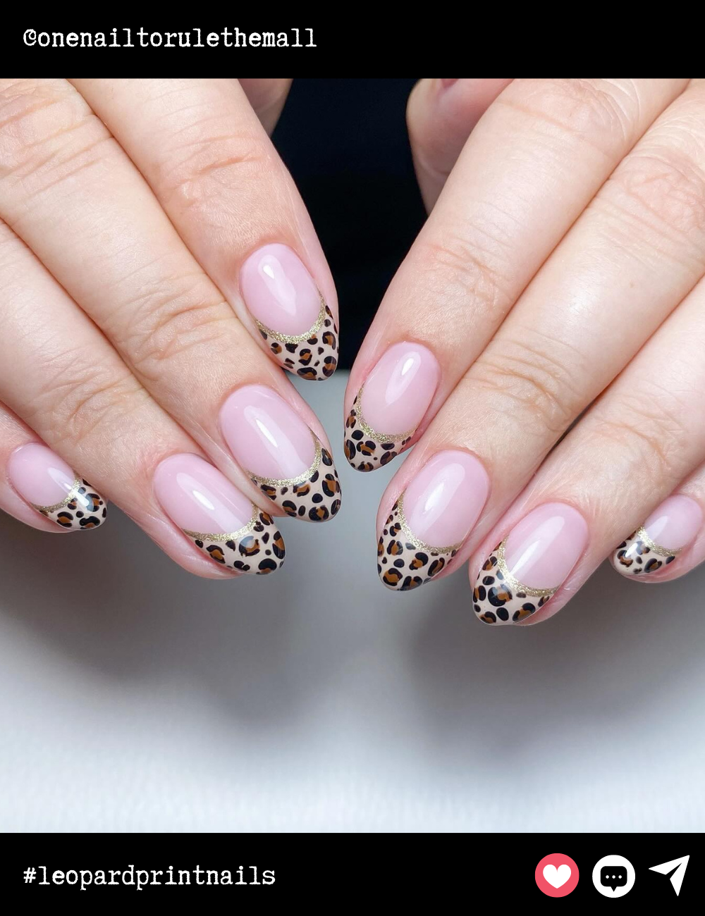 Almond-shaped nails stay classy with this refined French tip featuring a delicate leopard print and a hint of gold trim. Ideal for someone who wants a subtle touch of wild while keeping things elegant.