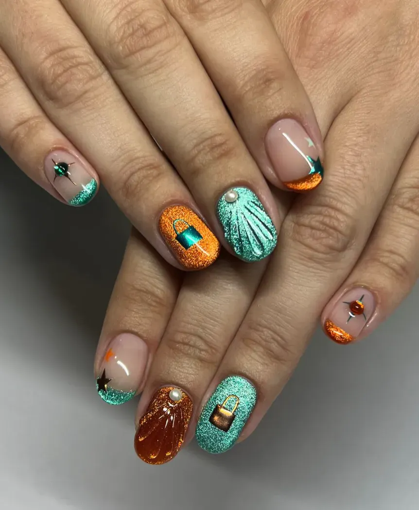 Shell-inspired textures, pearls, and teal/orange shimmer give this look a show-stopping, under-the-spotlight glow. A little fantasy, a little Broadway. 🩵🧡 Nail art design inspired by Life of a Showgirl Taylor Swift 🩵🧡