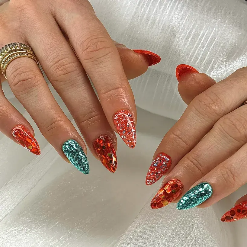 Chunky glitter in teal and orange steals the show here. These nails are bold, sparkly, and impossible to miss—just like Taylor on stage. 🩵🧡 Nail art design inspired by Life of a Showgirl Taylor Swift 🩵🧡