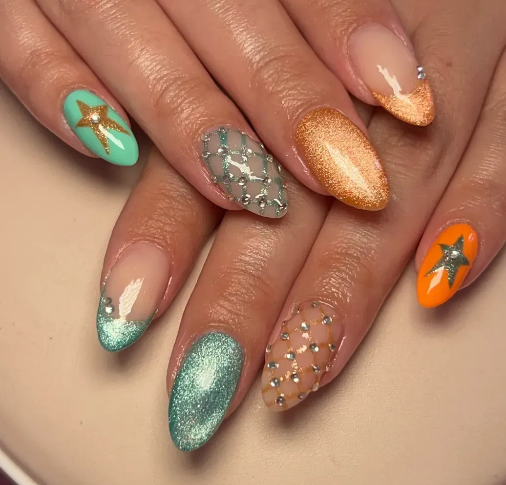 Mix and match metallic teal, glitter orange, and rhinestone-studded netting—like a stage costume turned into a manicure. 🩵🧡 Nail art design inspired by Life of a Showgirl Taylor Swift 🩵🧡