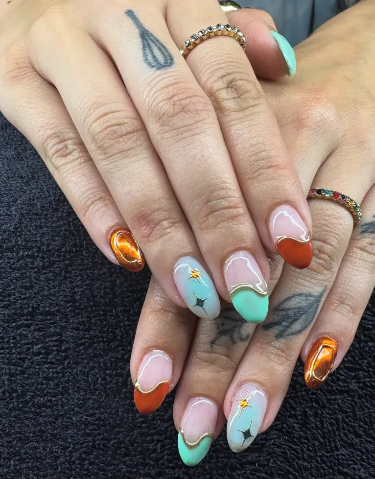 Half teal, half burnt orange with golden accents—this set gives you both sides of the spotlight. Soft and bold, glam and grounded. 🩵🧡 Nail art design inspired by Life of a Showgirl Taylor Swift 🩵🧡