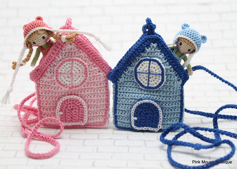 These adorable crochet dolls also come with a house - that's a necklace making it the perfect toy to travel with!