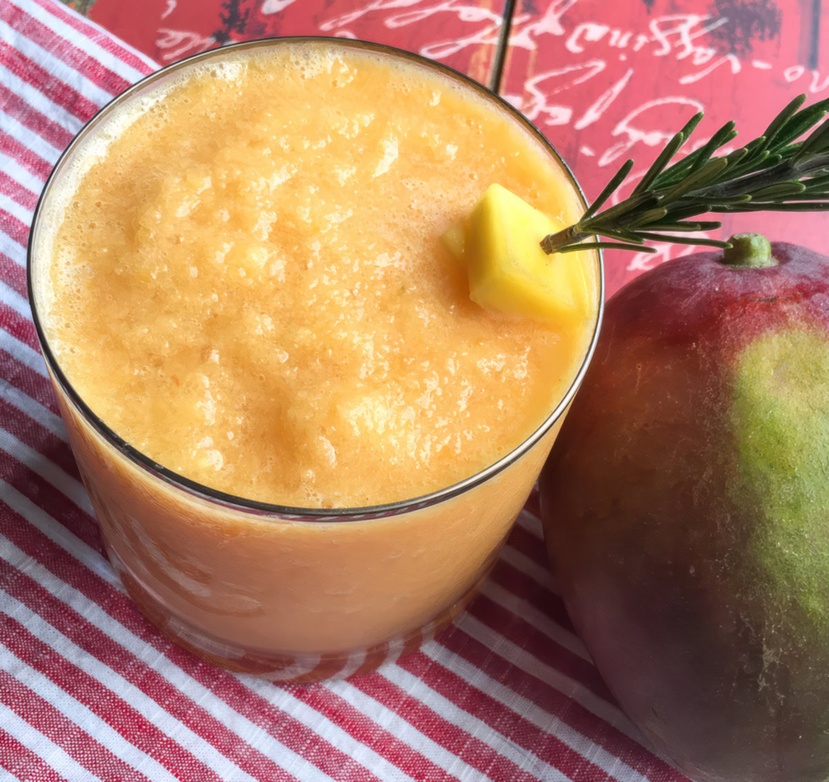 This delicious, refreshing frozen slushy does not require any added sweetener thanks to a healthy dose of fresh (or frozen) mango and orange juice. A small amount of fresh lime juice adds just the right amount of tanginess to balance out the sweeter flavors.