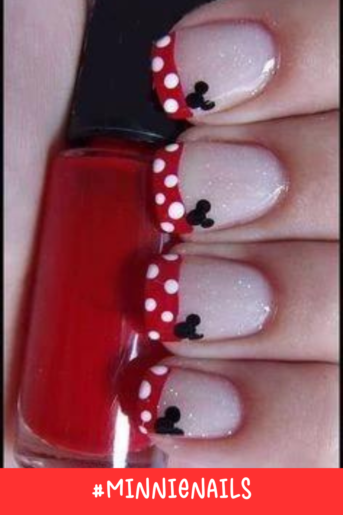 A fun take on a classic French tip with a Disney twist! These Minnie nails use a red polka-dot tip and a small Mickey silhouette on a nude base, creating a chic and simple Minnie Mouse nail design.