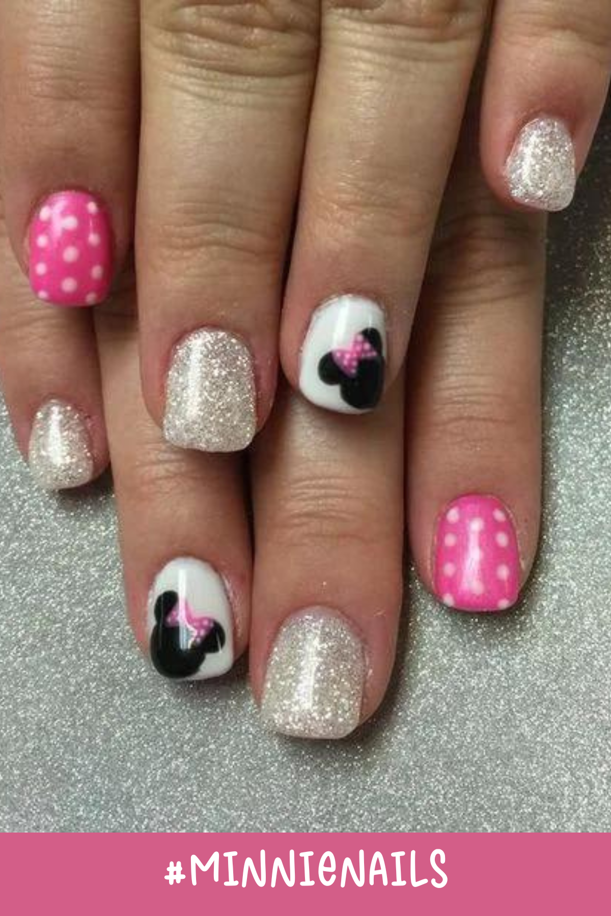 Glittery silver nails pair beautifully with pink polka-dot accents in this design. The highlight is the classic Minnie Mouse silhouette on white nails, ideal for a Disney-inspired manicure that’s both playful and chic.