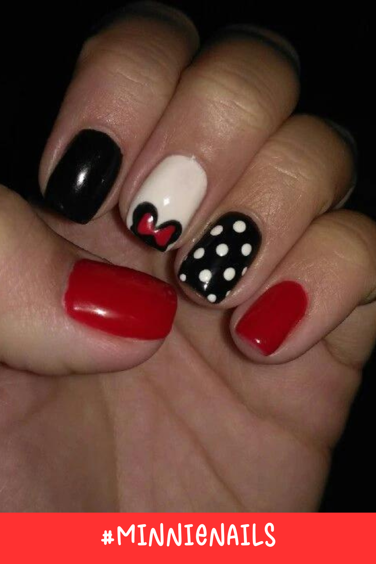 A polished take on Disney design nails with a monochrome palette. The red and black nails combined with the Minnie silhouette and polka dots give a chic and sophisticated nod to the Minnie Mouse style.