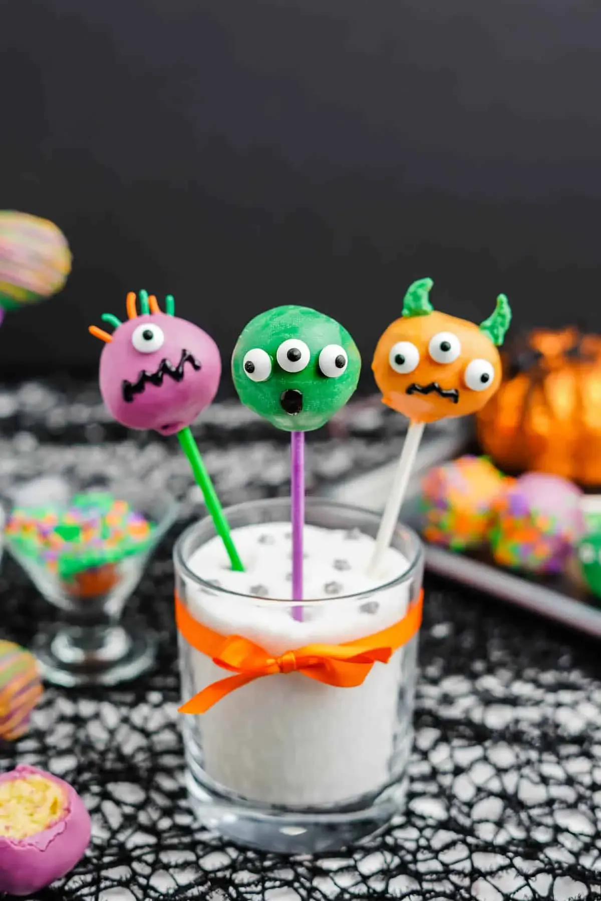 Colorful Monster Cake Pops – With googly eyes, bright colors, and silly expressions, these playful monster cake pops are full of Halloween fun.