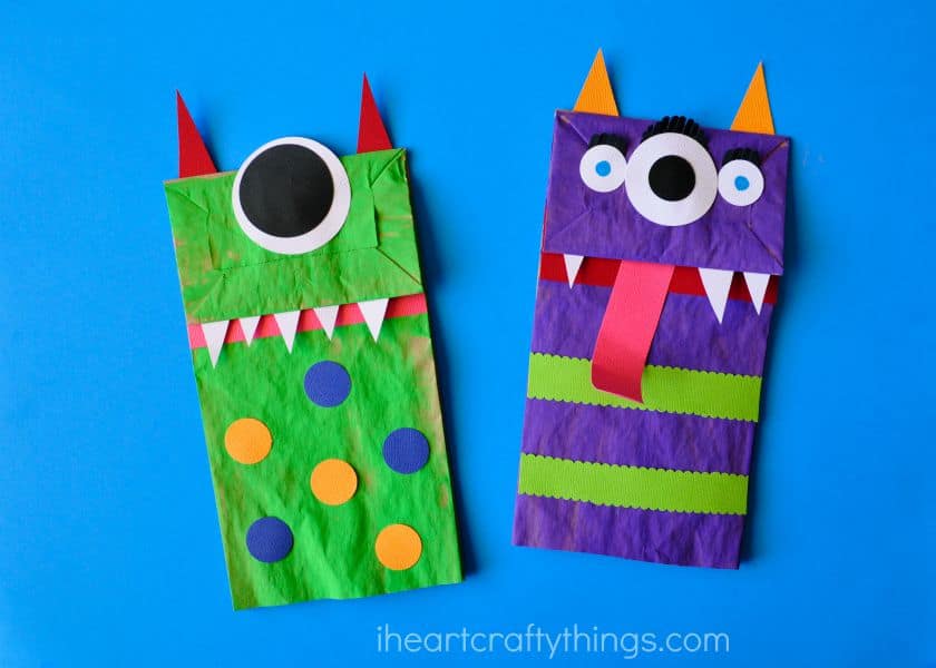 Paper Bag Monster - Halloween Craft for Kids - I don't think I've ever seen a pair of cuter looking monsters. This craft is perfect for little ones because it's easy to do with a little help from you and it's not too scary.