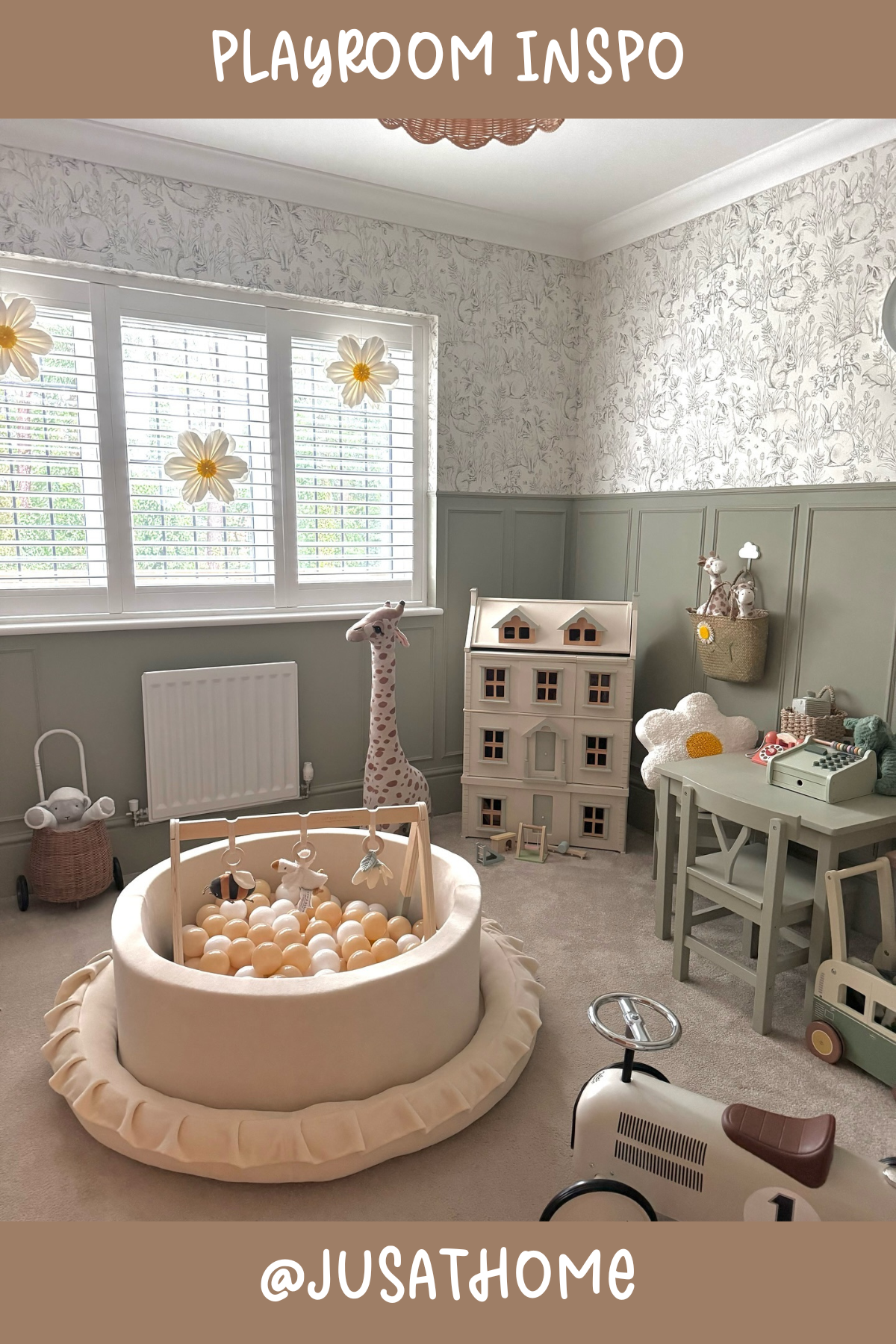 @jusathome - Elegance meets playfulness in this neutral-toned playroom. With its muted greens and creams, it feels serene and stylish, while the ball pit and toy car inject fun and excitement. The vintage-style playhouse and toys add a timeless charm to this adorable setup!