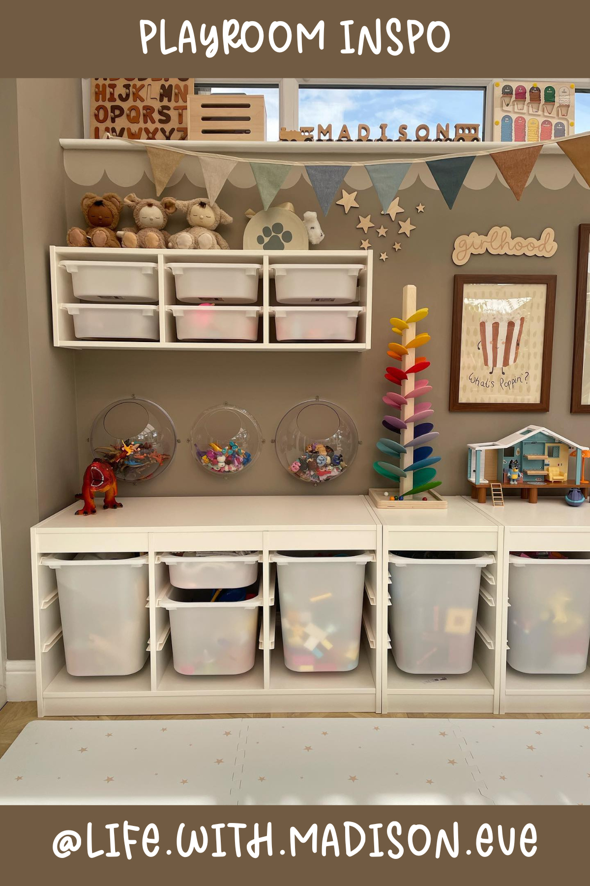 @life.with.madison.eve - A masterclass in toy storage, this playroom is all about clean lines and accessibility. The clear bins make toy sorting a breeze, and those hanging acrylic balls add a unique touch for displaying fun little treasures. We love the playful yet organized feel this room exudes!