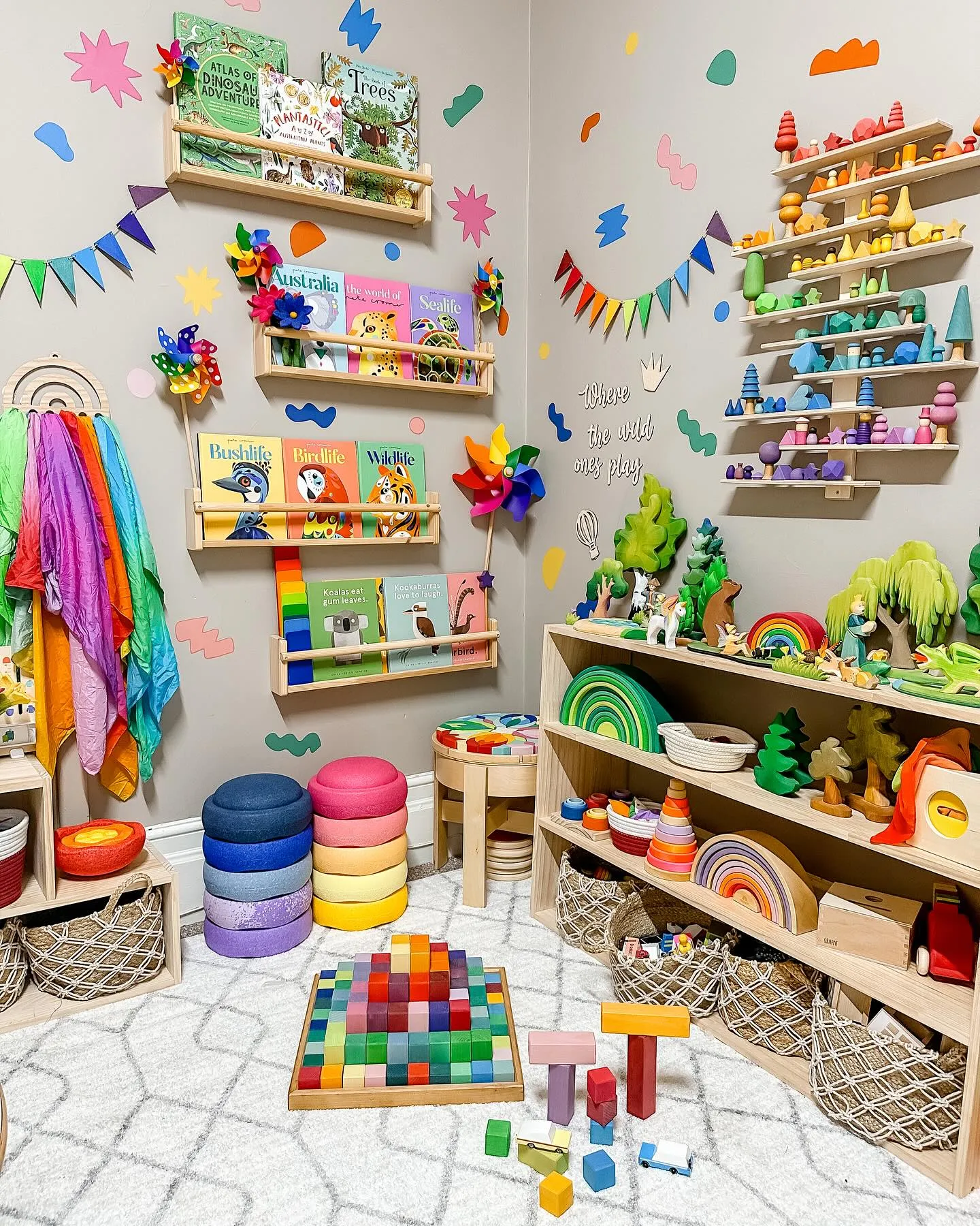 Colorful Montessori-Inspired Playroom – A bright and engaging space filled with wooden toys, rainbow stacking sets, and plenty of open-ended play opportunities for little explorers.