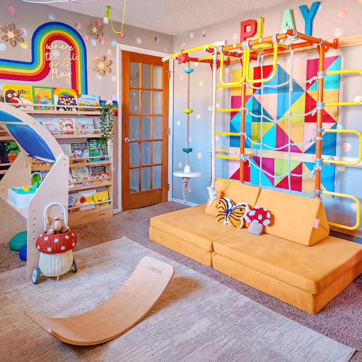 Indoor Jungle Gym Playroom – Bright colors, a built-in climbing structure, and cozy seating make this the ultimate active play space for high-energy kids.