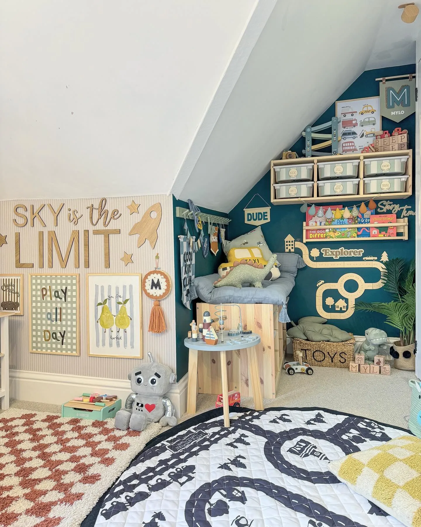 Explorer’s Loft Playroom – A cozy nook under the stairs with a travel-themed design, bold accent walls, and clever storage solutions that make every inch count.