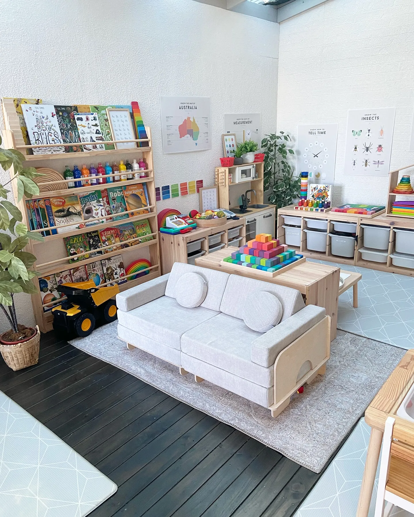 Montessori-Inspired Playroom with Open Shelving 🌿🎨This thoughtfully designed Montessori playroom features natural wood shelving, labeled bins, and a neutral color palette to encourage independent play. Everything has its place, making it easy for kids to find and return toys!