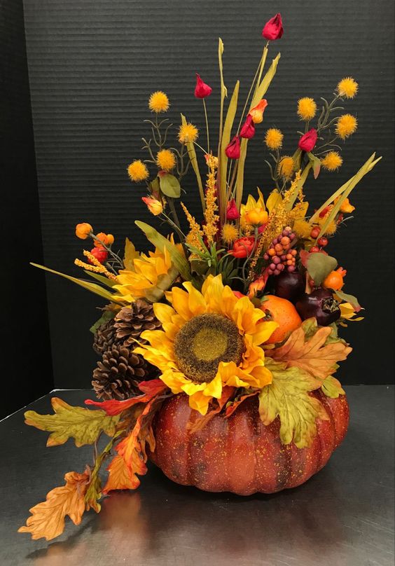 Get ready to decorate with these stunning fall flower arrangements in pumpkins! 🎃🍂 From real pumpkin flower arrangements to fake pumpkin flower arrangements, we've got you covered. 🌿 Discover unique designs that showcase the beauty of autumn with gorgeous blooms and festive gourds. Whether you're preparing for Thanksgiving or simply love fall vibes, these DIY arrangements are the perfect way to bring nature indoors. Learn how to make them yourself! 🧡✨ #FallDecor #PumpkinFlowers #DIYProjects