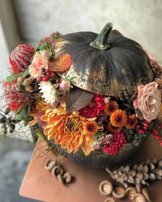 Want to create beautiful pumpkin flower arrangements this fall? Learn how to make a pumpkin flower arrangement with our simple guide! 🎃💐 Perfect for any occasion, these fall flower arrangements in pumpkins can be made with real or fake pumpkins. 🌿 Whether you're looking for a pumpkin with flowers on top or a full arrangement inside, these tips will help you craft the perfect centerpiece. Elevate your autumn decor with these creative DIY projects! 🍁✨ #PumpkinDecor #DIYArrangements #FallFlowers