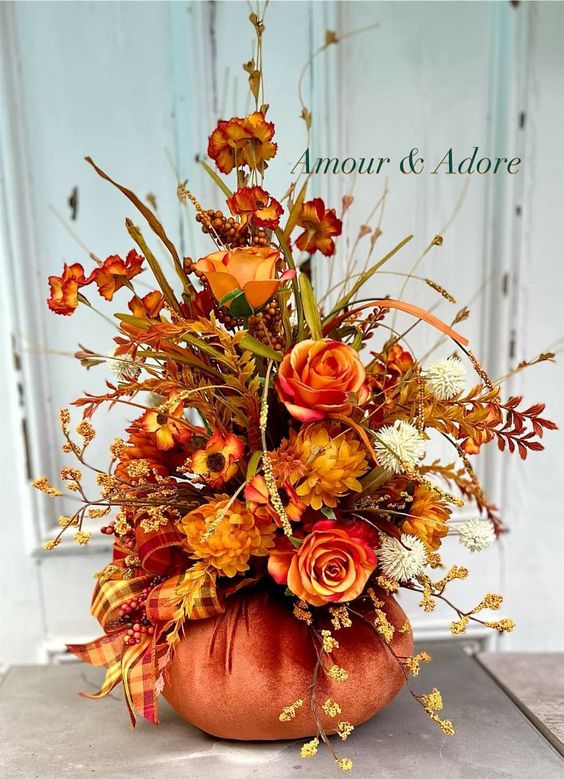 Transform your home with stunning Thanksgiving Pumpkin Flower Arrangements! 🎃💐 Perfect for adding a festive touch to your holiday decor, these DIY ideas blend seasonal flowers with both real and fake pumpkins. 🧡✨ Learn how to make your own beautiful creations with easy step-by-step guides. From gourd flower arrangements to charming centerpieces, these projects will impress your guests and bring the warmth of fall indoors! 🍁🏡 #ThanksgivingDecor #PumpkinFlowers #DIYHomeDecor