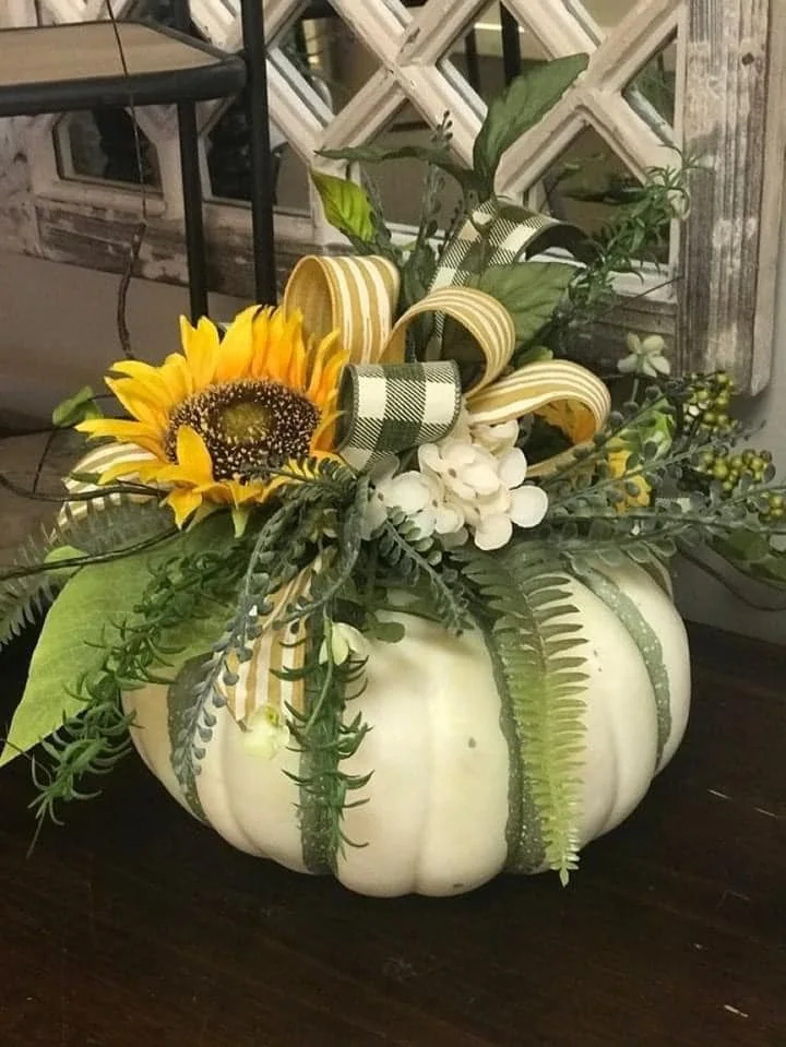 Want to create beautiful pumpkin flower arrangements this fall? Learn how to make a pumpkin flower arrangement with our simple guide! 🎃💐 Perfect for any occasion, these fall flower arrangements in pumpkins can be made with real or fake pumpkins. 🌿 Whether you're looking for a pumpkin with flowers on top or a full arrangement inside, these tips will help you craft the perfect centerpiece. Elevate your autumn decor with these creative DIY projects! 🍁✨ #PumpkinDecor #DIYArrangements #FallFlowers